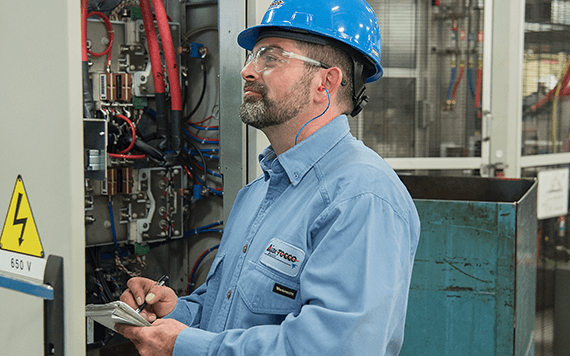 man in a hard hat reviewing work