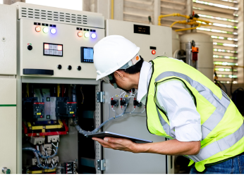 worker performing a maintenance check.